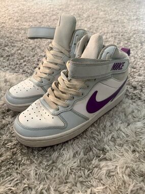 Nike Women’s Mid-Top Sneakers in White and Purple Accents